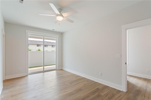 unfurnished room featuring ceiling fan and light wood-type flooring