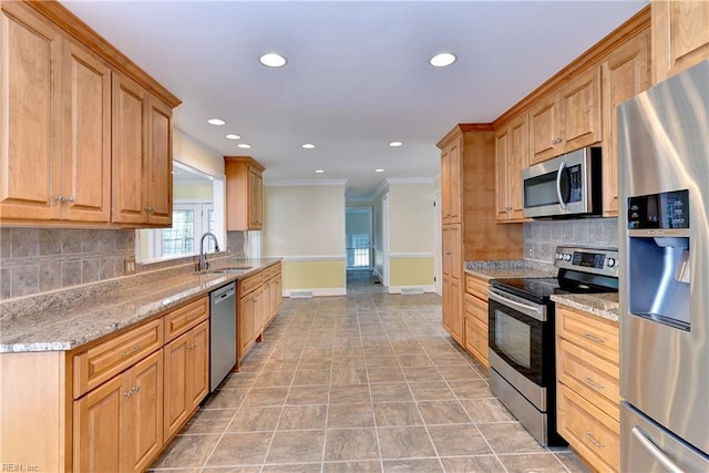 kitchen featuring decorative backsplash, light stone countertops, and stainless steel appliances