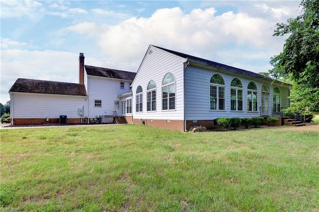 view of home's exterior featuring a yard and cooling unit