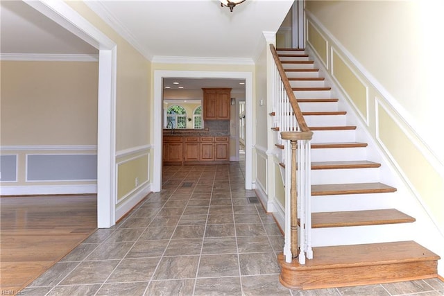 stairs with ornamental molding and sink