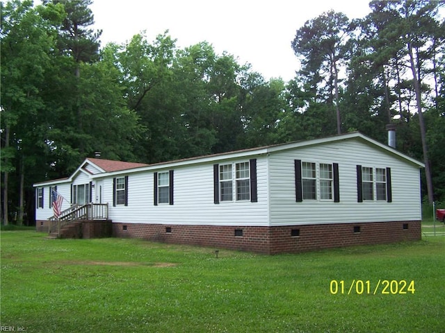34026 Doctors Rd, Newsoms, VA 23874 - manufactured / mobile home featuring a front lawn and crawl space