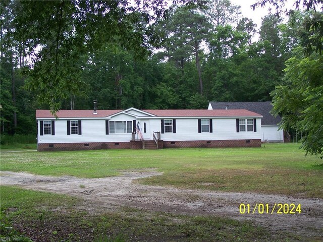 34026 Doctors Rd, Newsoms, VA 23874 - manufactured / mobile home with entry steps, a front yard, and crawl space