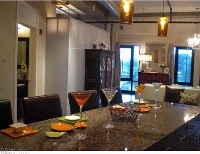 dining space with a chandelier