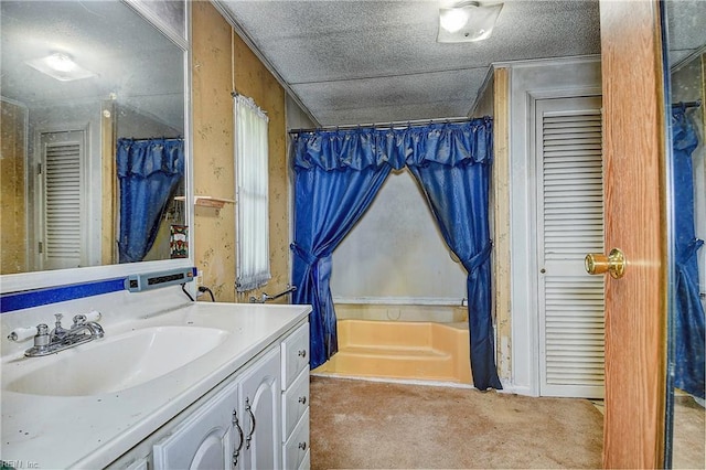 full bath with a textured ceiling, a closet, a shower with shower curtain, and vanity