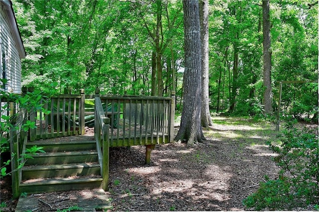 view of yard with a wooden deck