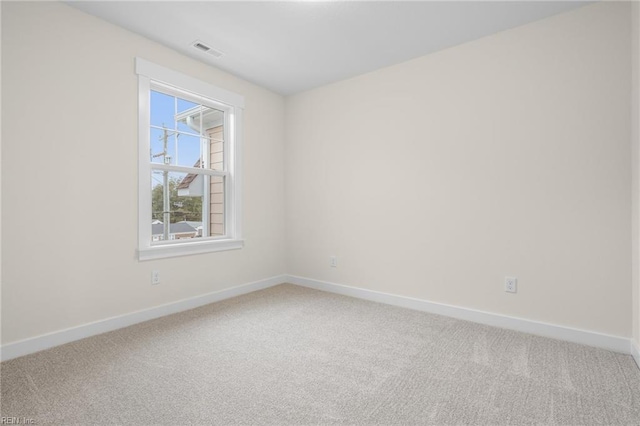 empty room featuring carpet flooring