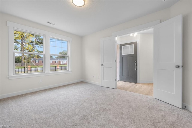 view of carpeted spare room