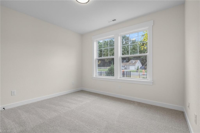 empty room featuring carpet floors