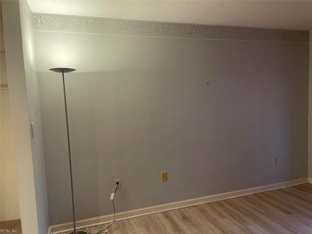 unfurnished room featuring light hardwood / wood-style floors