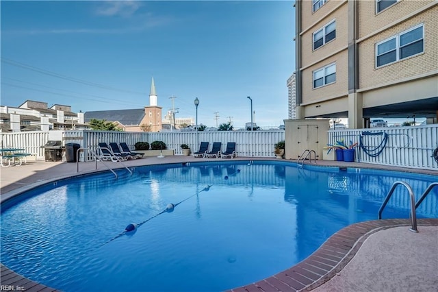 view of pool with a patio area