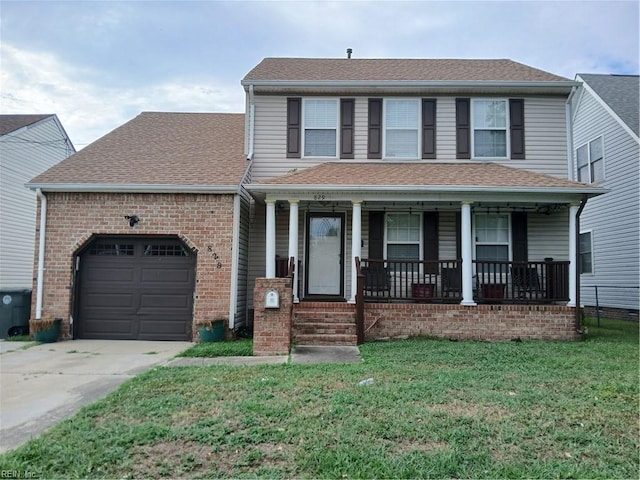 view of front facade with a garage, covered porch, and a front yard