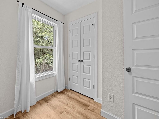 doorway to outside featuring light hardwood / wood-style floors