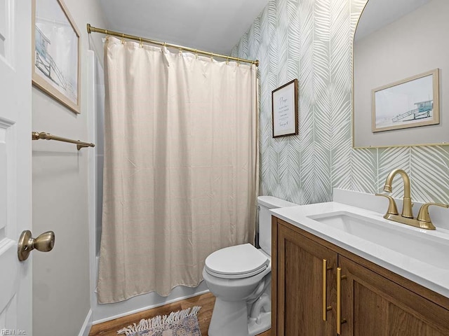 full bathroom featuring shower / bath combination with curtain, vanity, toilet, and wood-type flooring