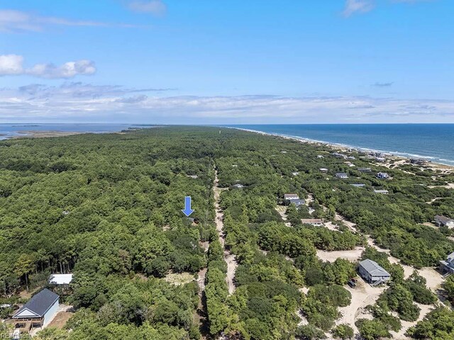 aerial view featuring a water view and a beach view