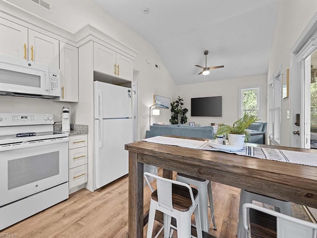 kitchen featuring white appliances, ceiling fan, light hardwood / wood-style floors, white cabinets, and vaulted ceiling