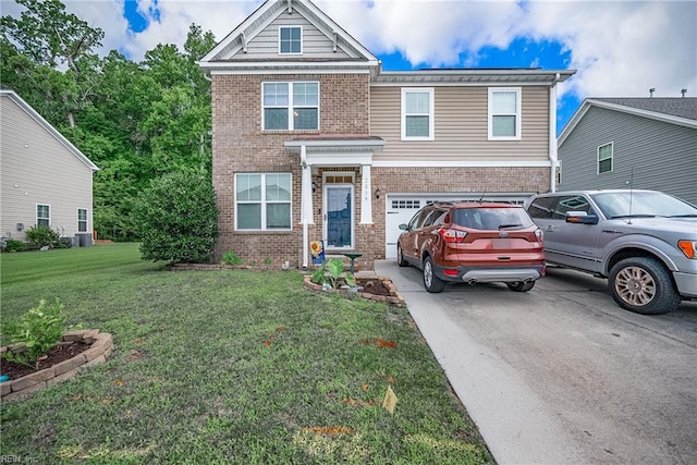 view of front of property featuring a garage and a front yard