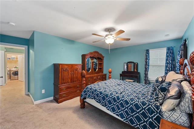 bedroom with washer / clothes dryer, light carpet, and ceiling fan