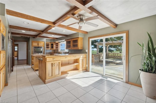 kitchen featuring coffered ceiling, beamed ceiling, light tile patterned floors, ceiling fan, and stainless steel oven