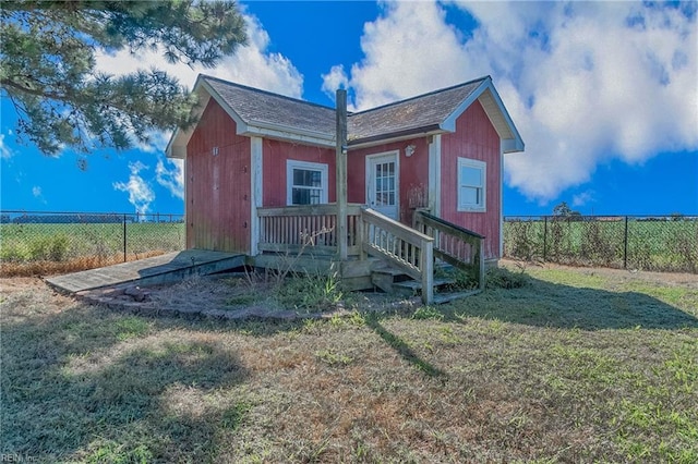 exterior space with a front yard