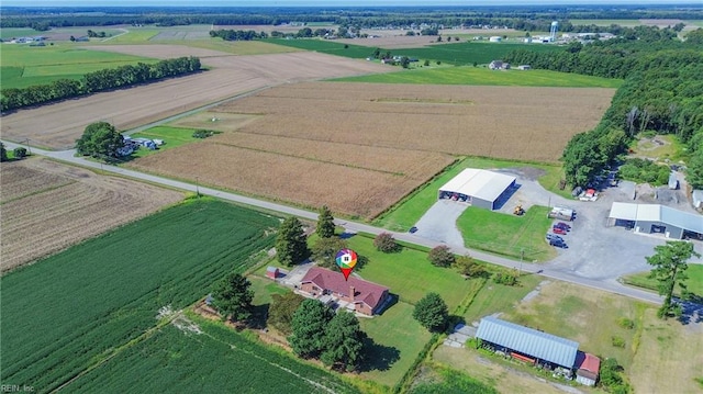 birds eye view of property featuring a rural view