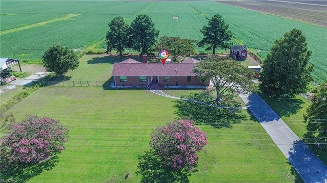 birds eye view of property featuring a rural view