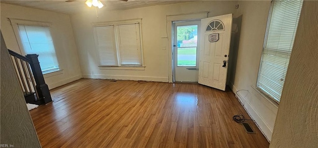 entrance foyer featuring light wood-type flooring and ceiling fan