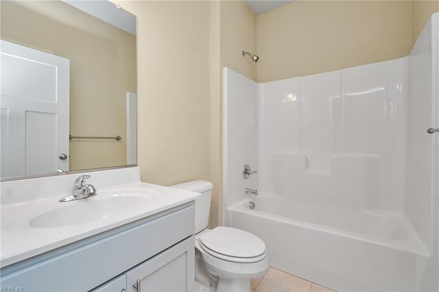 full bathroom featuring bathing tub / shower combination, toilet, vanity, and tile patterned floors