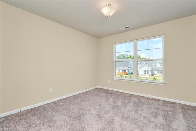 empty room with carpet floors