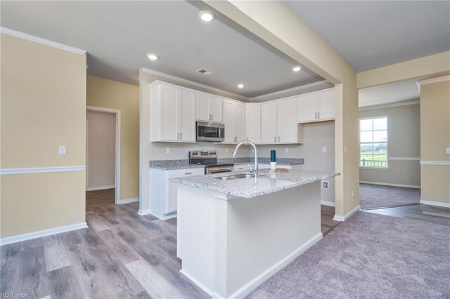 unfurnished living room featuring dark colored carpet and ceiling fan