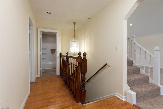 hallway with light wood-type flooring