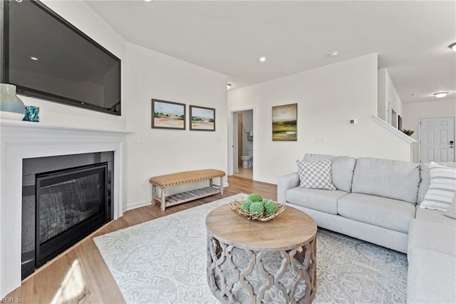 living room with light hardwood / wood-style floors