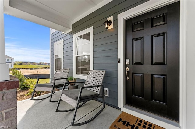 property entrance featuring covered porch