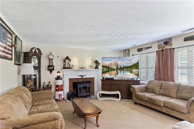 living room with a fireplace, crown molding, and light colored carpet