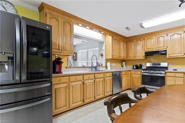 kitchen with sink, light tile patterned floors, crown molding, and stainless steel appliances