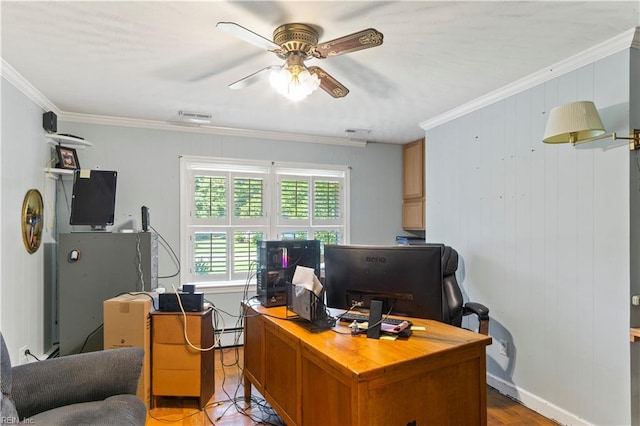 office space featuring ceiling fan and crown molding