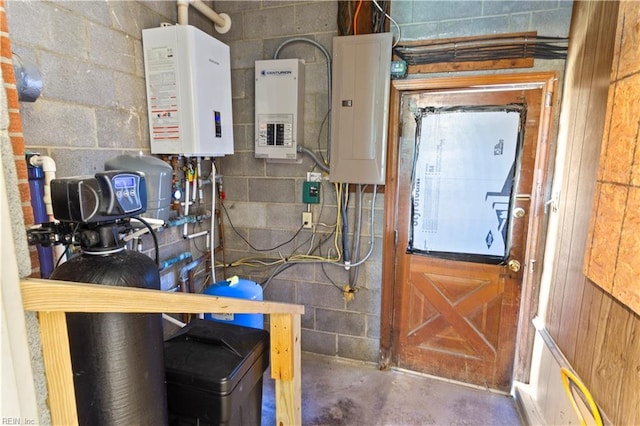 utility room with electric panel and water heater