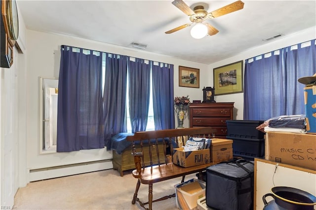 interior space featuring baseboard heating and ceiling fan