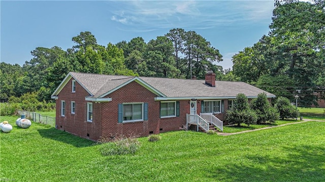 single story home with a front yard