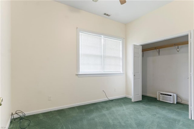 unfurnished bedroom featuring a closet, carpet, and ceiling fan