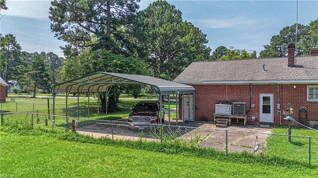 view of yard with a carport