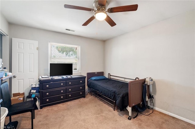 carpeted bedroom featuring ceiling fan