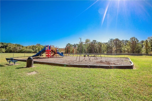 view of jungle gym with a yard