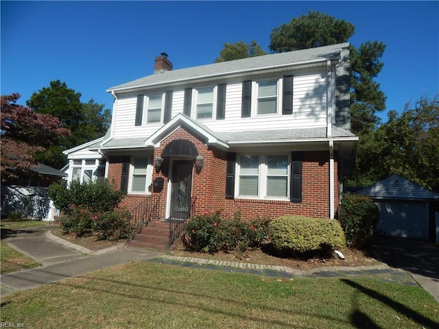 view of front facade featuring a front yard