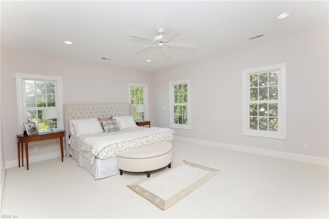 carpeted bedroom with ceiling fan