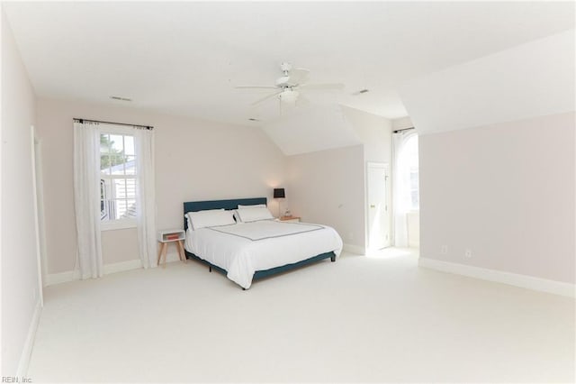 carpeted bedroom with lofted ceiling and ceiling fan