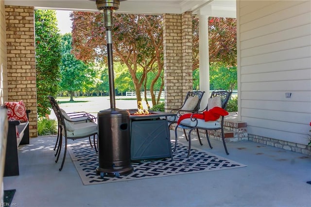 view of patio / terrace featuring a fire pit