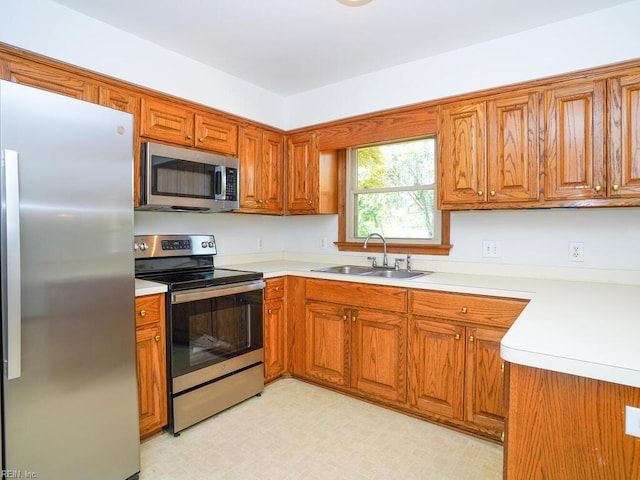 kitchen featuring sink and stainless steel appliances