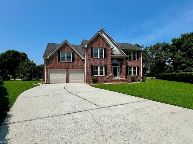 view of front of property with a garage and a front yard