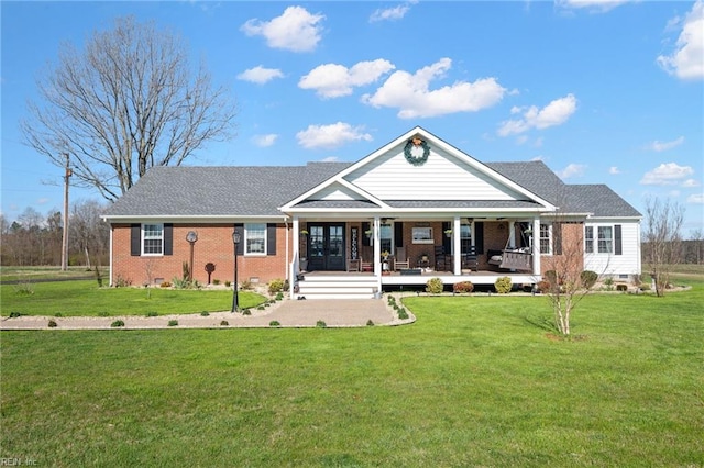 exterior space featuring a yard and covered porch