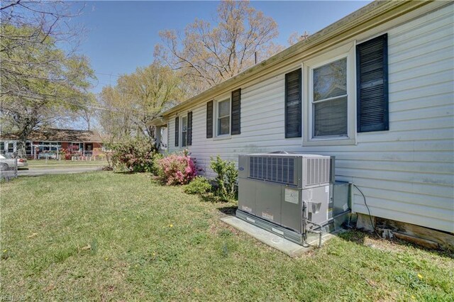 view of yard with central AC